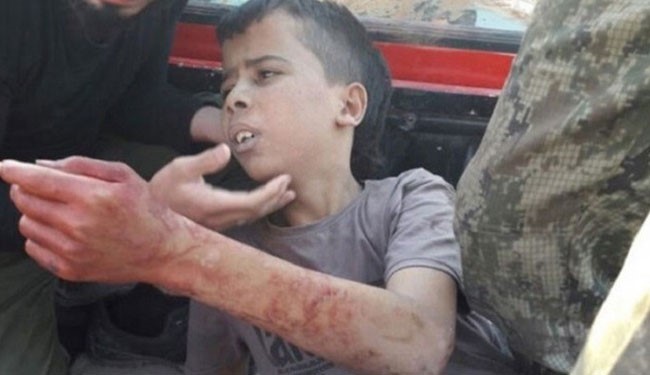 الطفل عبد الله عيسى قبل ذبحه من قبل الارهابيين