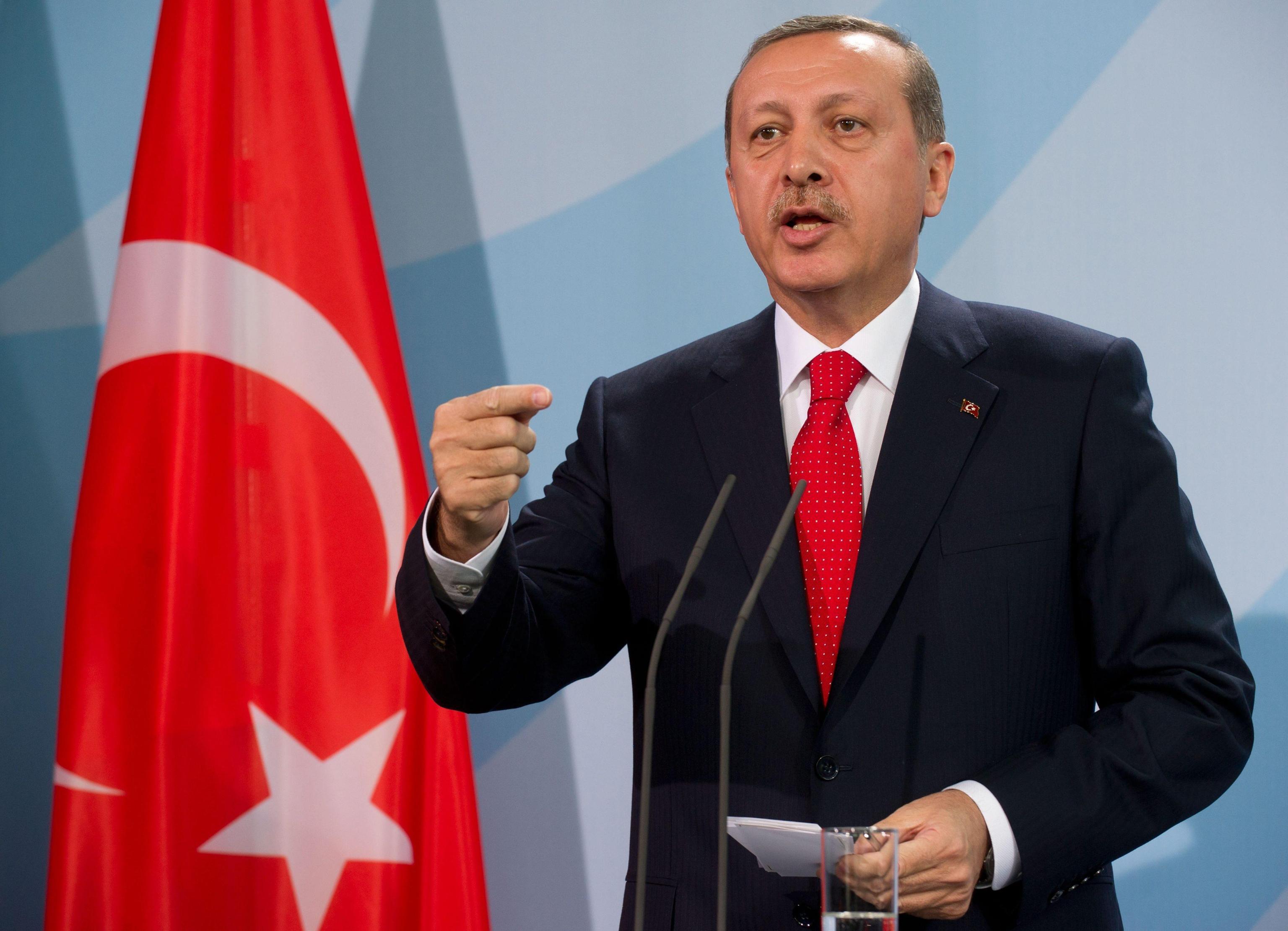 (FILE) Turkish Prime Minister Recep Tayyip Erdogan gives a press conference after meeting for talks with German Chancellor Merkel at the Federal Chancellery in Berlin, Germany, 31 October 2012. EPA/TIM BRAKEMEIR