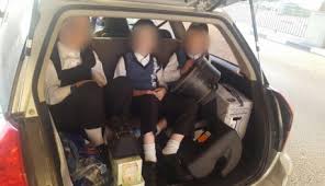 القبض على سائق ينقل 7 أطفال في صندوق مركبته