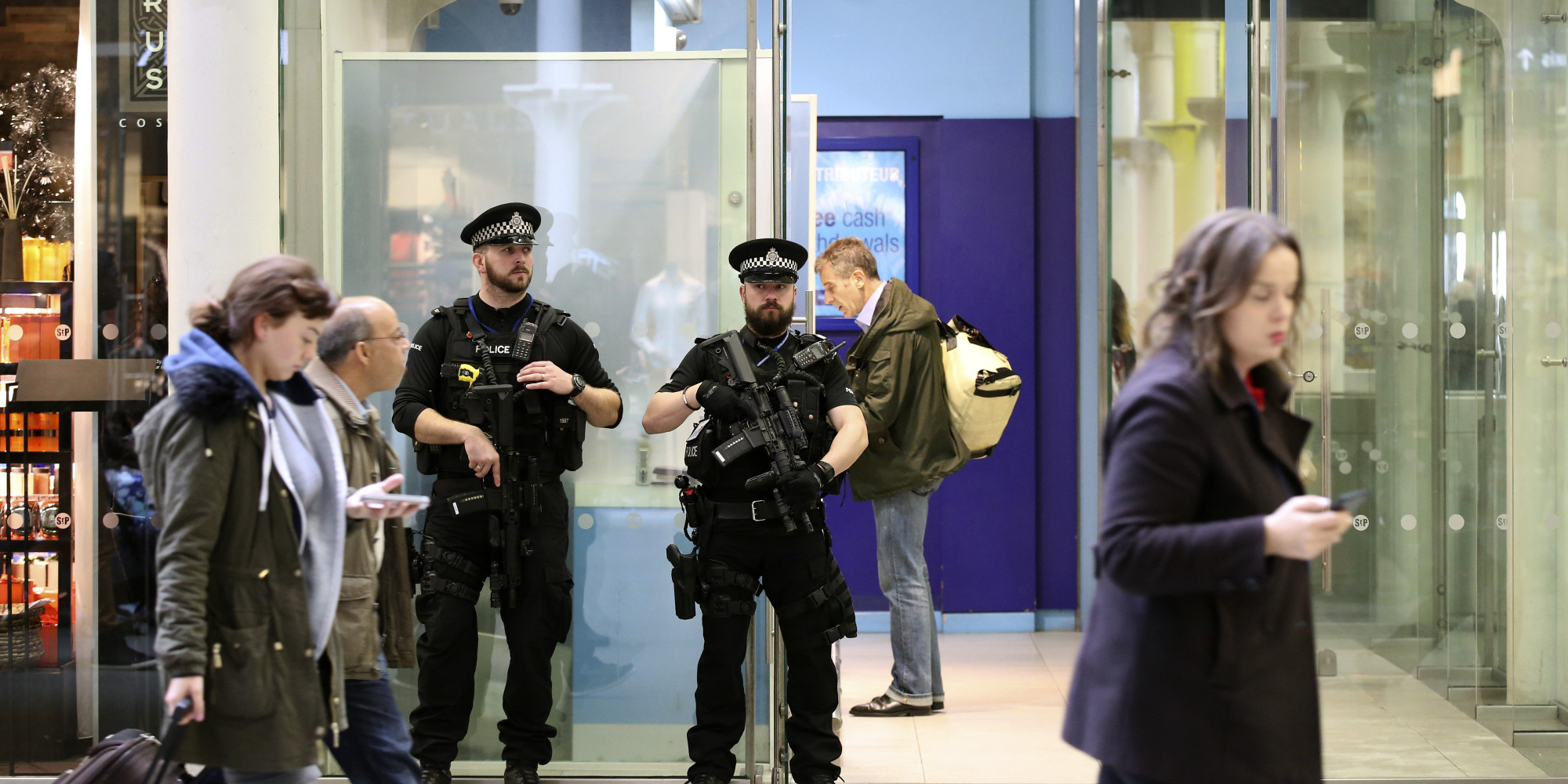 Armed police stand on duty at St Pancras International Station in London, Britain November 16, 2015. REUTERS/Paul Hackett