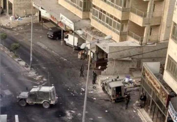 اصابة سيدة بـ”المطاط” والعشرات بالاختناق في اقتحام الاحتلال لبلدة الرام