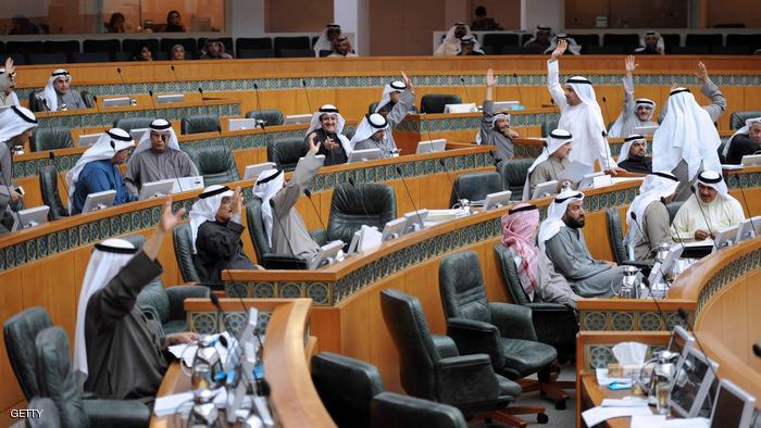 Kuwaiti MPs vote during a parliament session at Kuwait's national assembly in Kuwiat City on February 11,2015 during which they approved a five-year development plan that envisages spending of 34.15 billion dinars ($116 billion/103 billion euros) on projects despite a sharp drop in oil prices. The vote on the plan, which starts in April and ends March 2020, was 33-4, with one abstention. AFP PHOTO / YASSER AL-ZAYYAT (Photo credit should read YASSER AL-ZAYYAT/AFP/Getty Images)