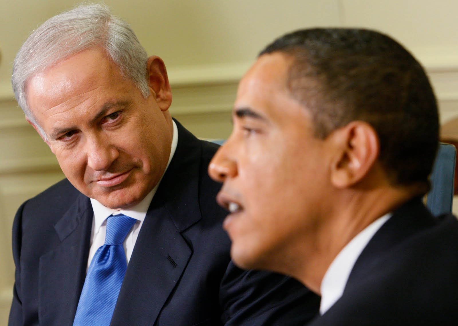 Israeli Prime Minister Benjamin Netanyahu looks towards President Barack Obama as he speaks to reporters in the Oval Office of the White House in Washington, Monday, May 18, 2009. (AP Photo/Charles Dharapak)