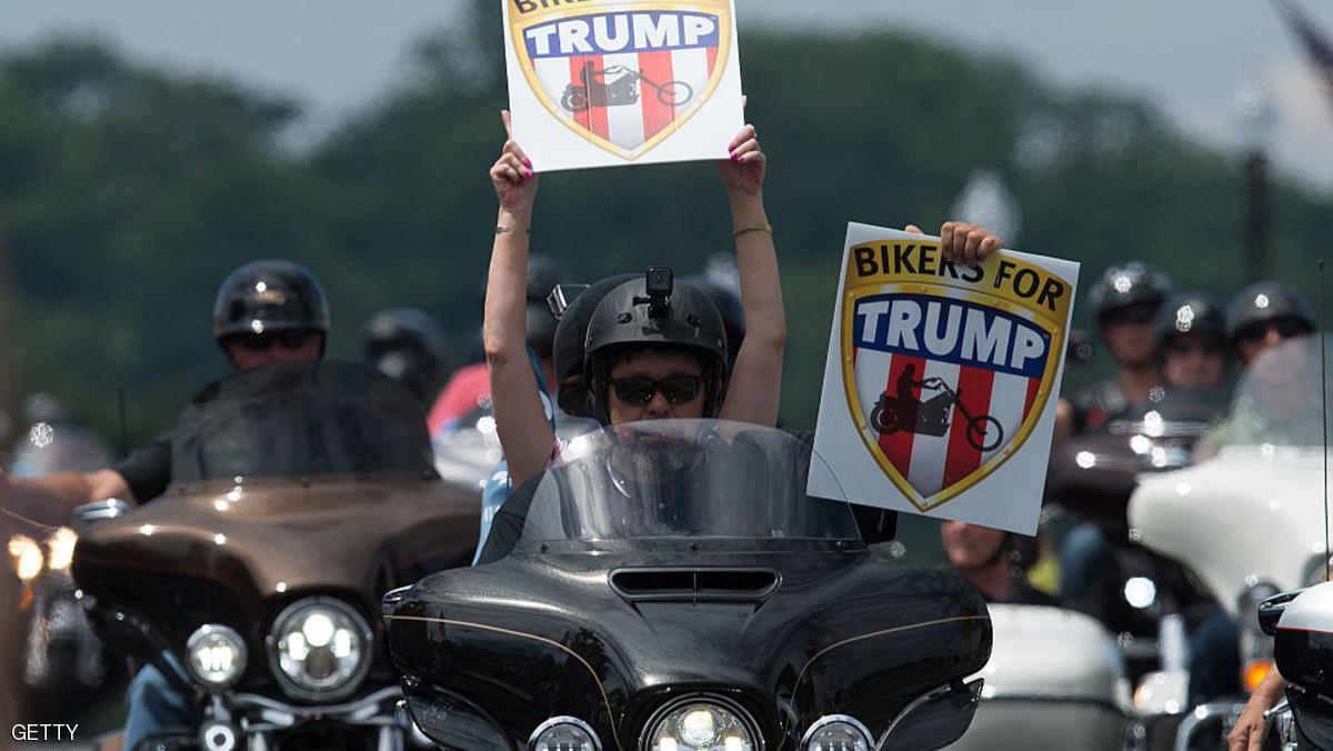 Veterans ride on motorbikes holding signs of support for Republican presidential candidate Donald Trump during the Rolling Thunder rally in Washington, DC on May 29, 2016. Rolling Thunder is an advocacy group dedicated to raising awareness for American Prisoners of War and warriors currently missing in action. / AFP / andrew caballero-reynolds (Photo credit should read ANDREW CABALLERO-REYNOLDS/AFP/Getty Images)