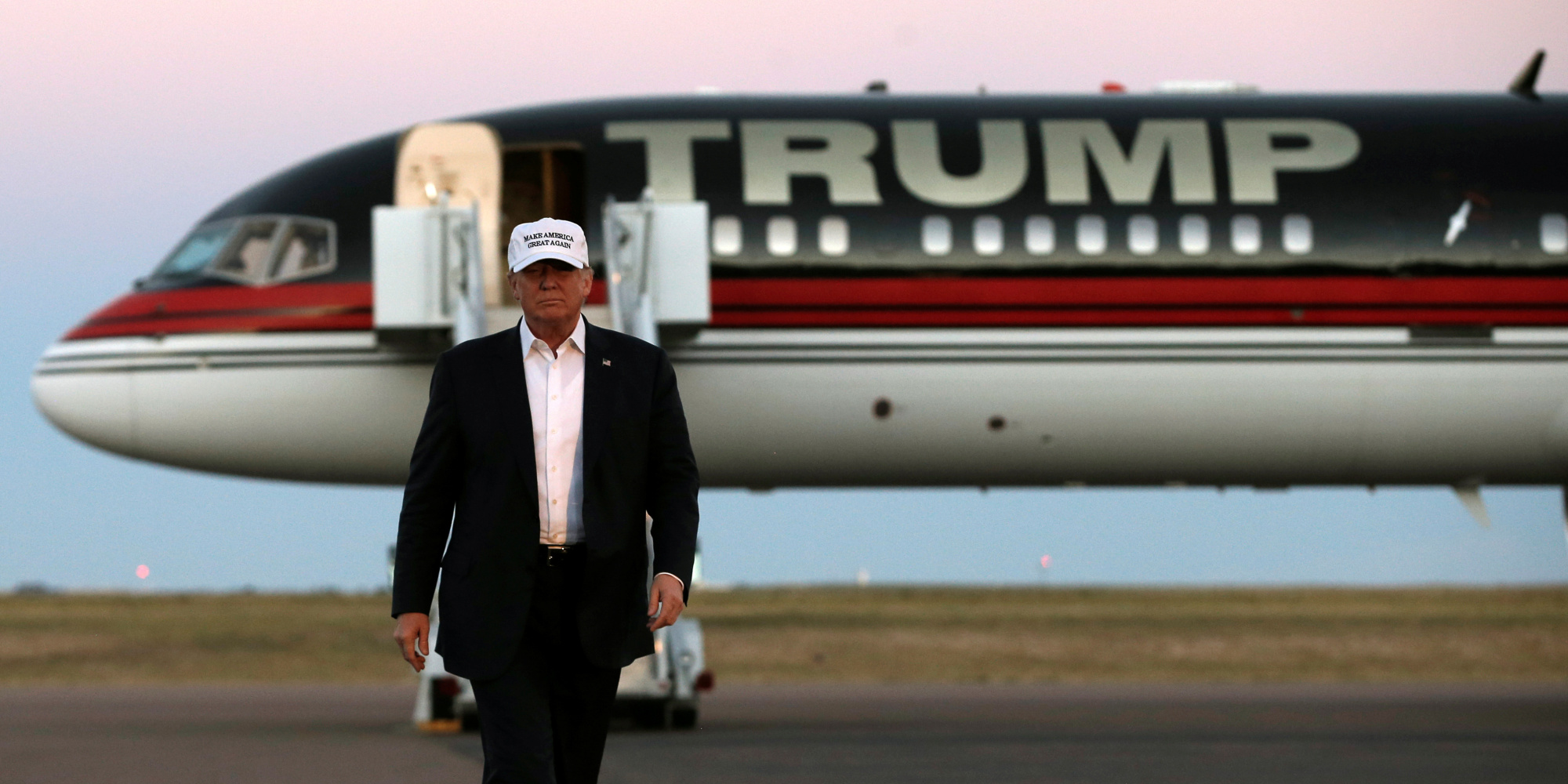 Republican presidential nominee Donald Trump walks off his plane at a campaign rally in Colorado Springs, Colorado, U.S., September 17, 2016. REUTERS/Mike Segar TPX IMAGES OF THE DAY