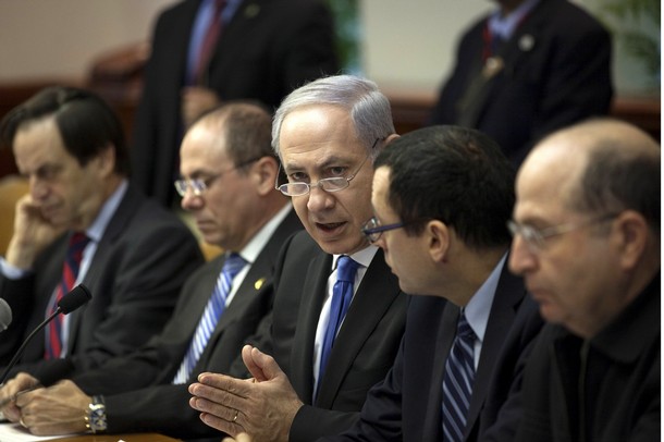 JERUSALEM, ISRAEL - JANUARY 09: Israeli Prime Minister Benjamin Netanyahu (C) addresses his cabinet during the weekly cabinet meeting on January 9, 2011 in Jerusalem, Israel. Netanyahu addressed his cabinet following a week of reports of further unrest in Israel's fragile coalition centering on the breakdown of peace talks. (Photo by Menahem Kahana - Pool/Getty Images)