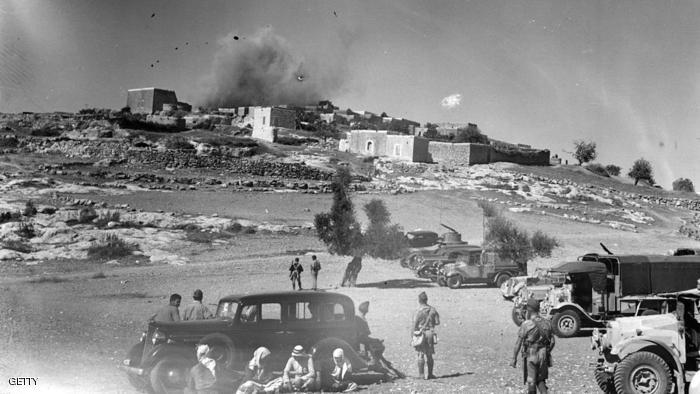 The Arab village of Miar, near Haifa, being blown up during a period of unrest in the British mandate of Palestine. This is a punishment and warning to rebels, by the British. (Photo by Fox Photos/Getty Images)