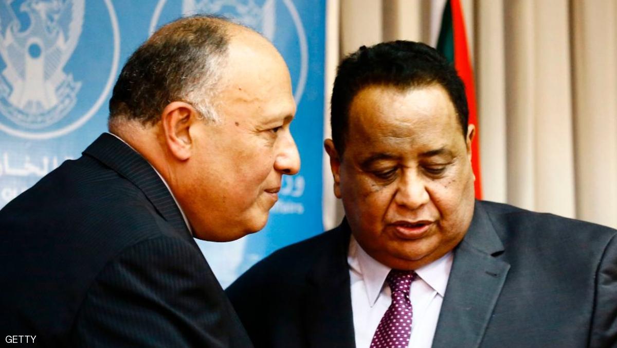 Sudanese Foreign Minister Ibrahim Ghandour (R) speaks with his Egyptian counterpart Sameh Shokry following a press conference in Khartoum on April 20, 2017. Relations between neighbours Cairo and Khartoum have been tense, with Sudanese President Omar al-Bashir accusing Egyptian intelligence services of supporting Sudanese opposition figures fighting his troops. / AFP PHOTO / ASHRAF SHAZLY (Photo credit should read ASHRAF SHAZLY/AFP/Getty Images)