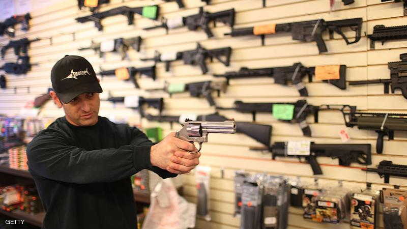 DELRAY BEACH, FL - JANUARY 05: Brandon Wexler shows a customer one of the weapons that she was picking up at the end of the three day waiting period at the K&W Gunworks store on the day that U.S. President Barack Obama in Washington, DC announced his executive action on guns on January 5, 2016 in Delray Beach, Florida. President Obama announced several measures that he says are intended to advance his gun safety agenda. (Photo by Joe Raedle/Getty Images)