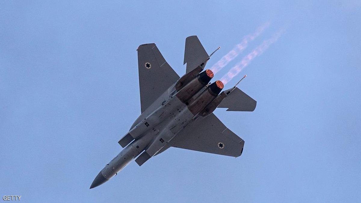 An Israeli F-15 fighter jet performs in an air show during the graduation ceremony of Israeli air force pilots at the Hatzerim base in the Negev desert, near the southern Israeli city of Beer Sheva, on December 29, 2016. / AFP / JACK GUEZ (Photo credit should read JACK GUEZ/AFP/Getty Images)