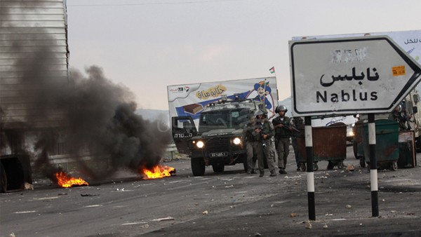 إصابة نحو 40 مواطنا بالرصاص المعدني والغاز في مواجهات جنوب نابلس