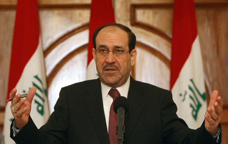 Iraqi Prime Minister Nuri al-Maliki holds a press conference in Baghdad on May 11, 2011 as he called for a dialogue with rival blocs to gauge whether or not US troops currently in Iraq should stay beyond a year-end deadline for their withdrawal. AFP PHOTO/AHMAD AL-RUBAYE