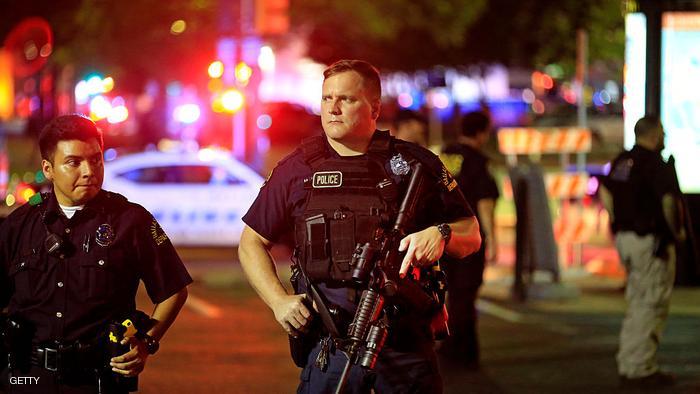 DALLAS, TX - JULY 7: Dallas police stand watch near the scene where four Dallas police officers were shot and killed on July 7, 2016 in Dallas, Texas. According to reports, shots were fired during a protest being held in downtown Dallas in response to recent fatal shootings of two black men by police - Alton Sterling on July 5, 2016 in Baton Rouge, Louisiana and Philando Castile on July 6, 2016, in Falcon Heights, Minnesota. (Photo by Ron Jenkins/Getty Images)